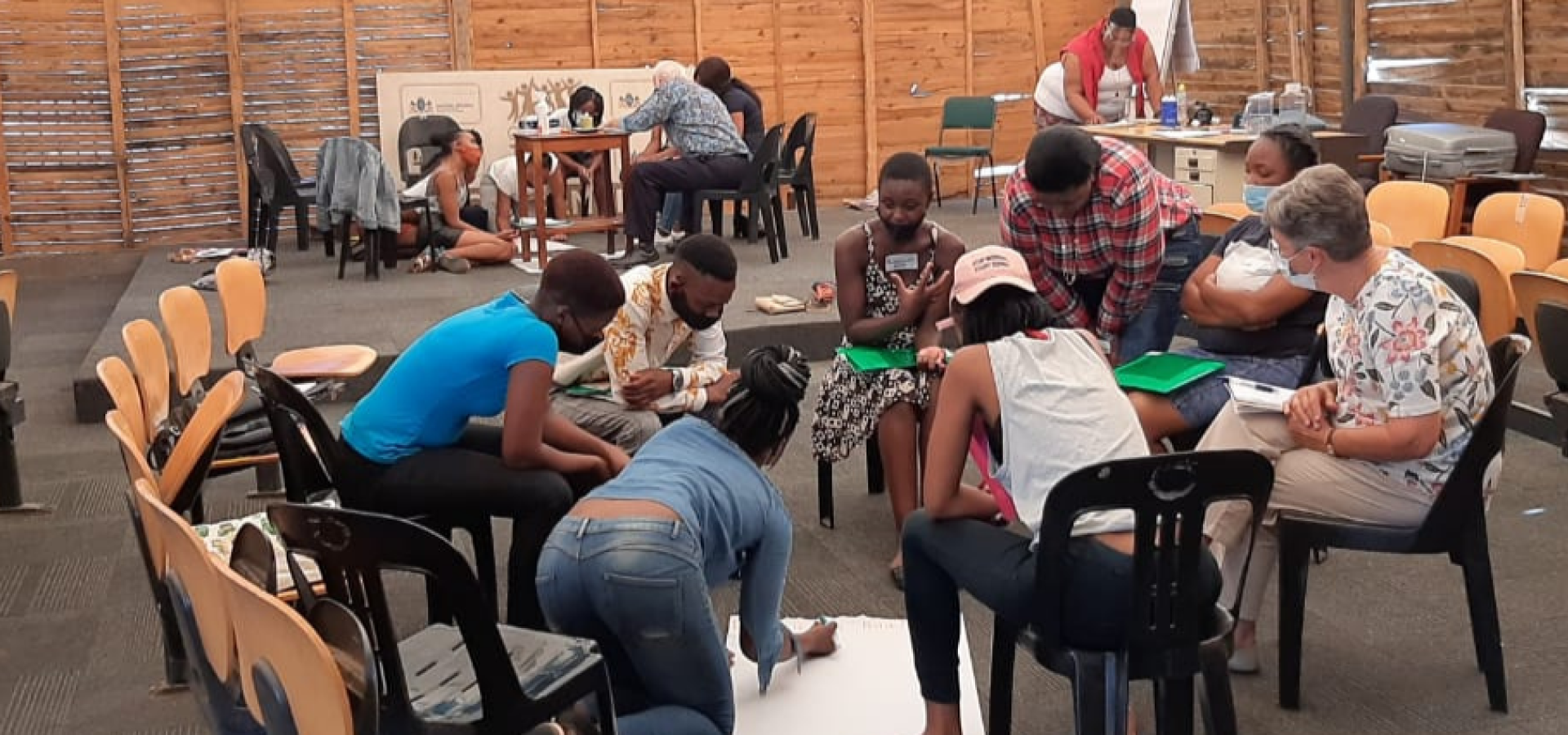 Participants engaging in inner healing activities during the Creators or Peace workshops in Johannesburg. 